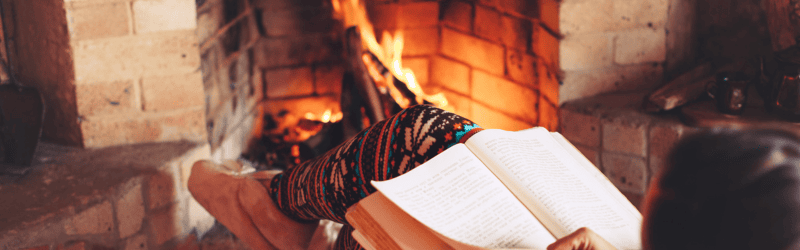 Stay Warm Indoors Reading by Fireplace