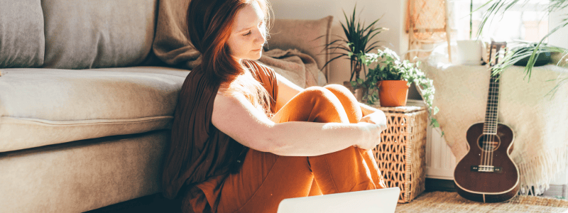 Red Head Girl Contemplating Life After Online Therapy Session Involving Self Discovery